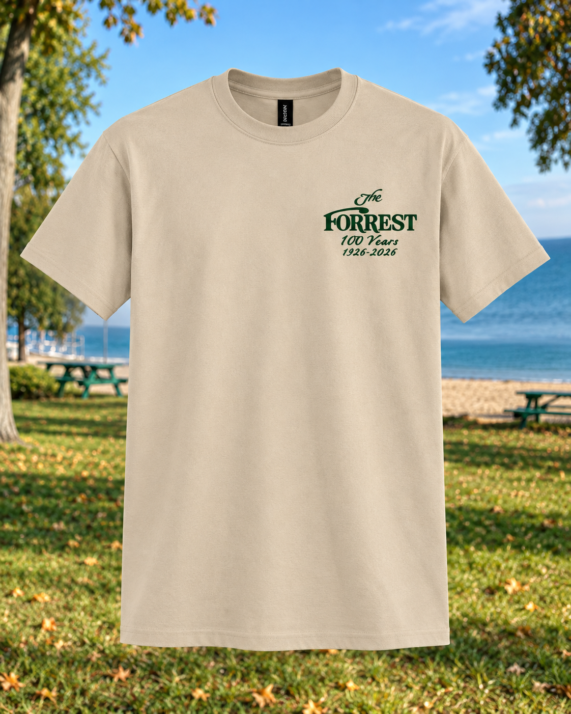 Sand Gildan 8000 T-shirt with The Forrest 100 Years forest green left-chest crest.