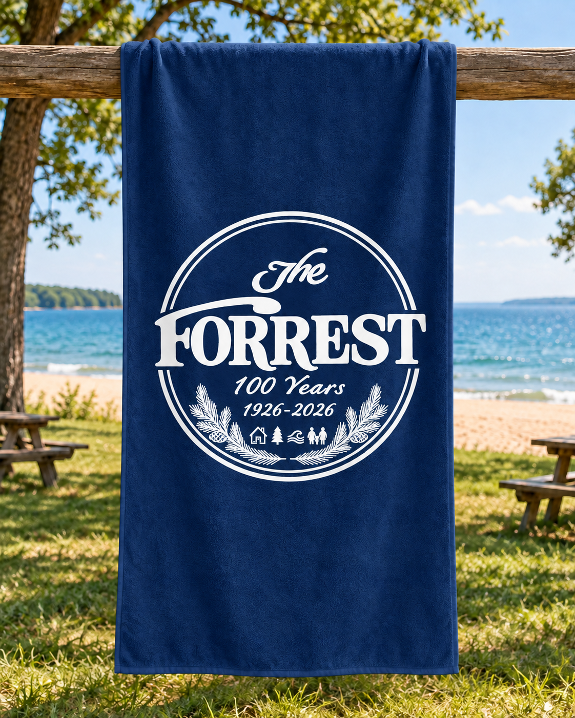Navy PT44 beach towel with The Forrest 100 Years centennial emblem in white.