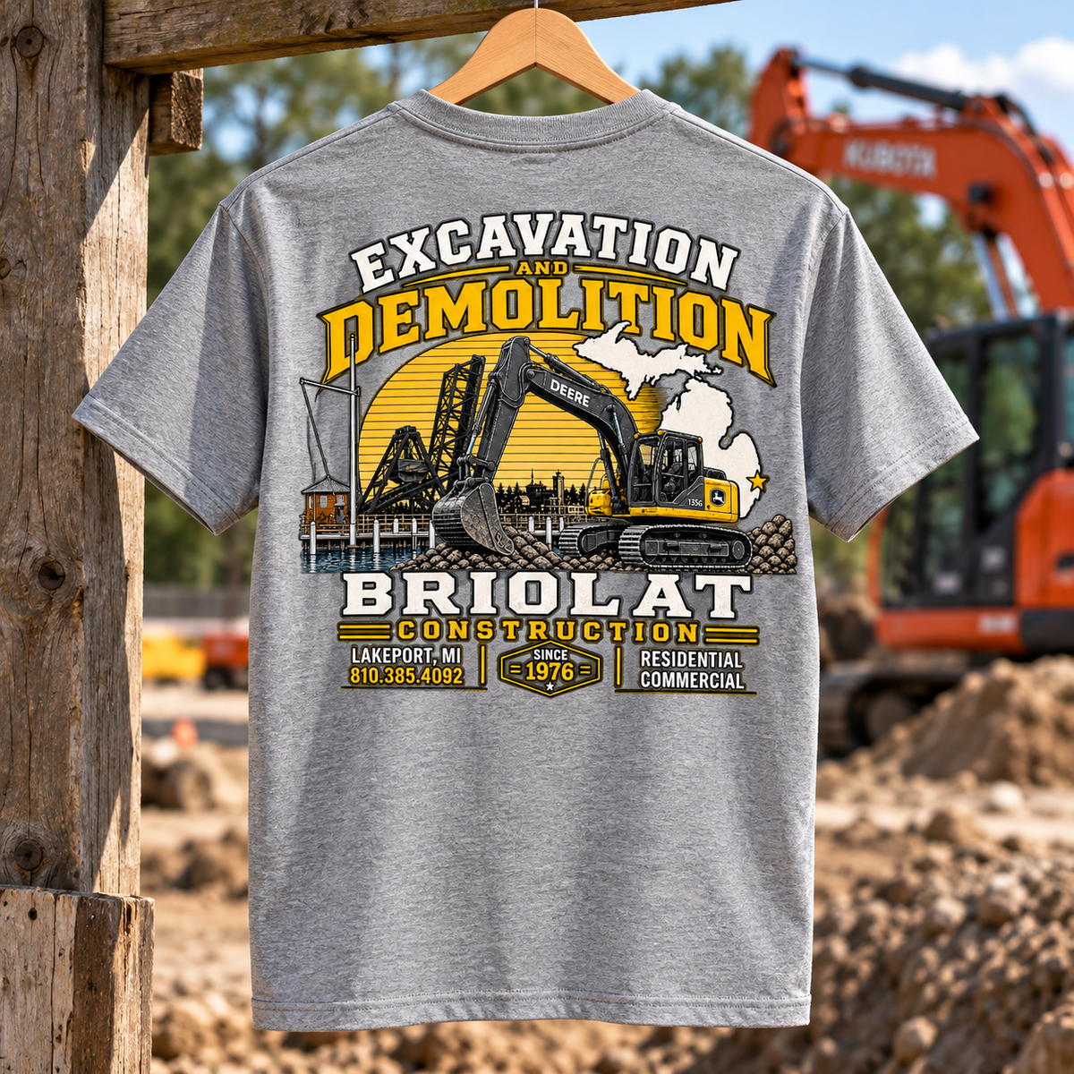 Briolat Construction PC55 new logo – Athletic Heather – back jobsite mockup