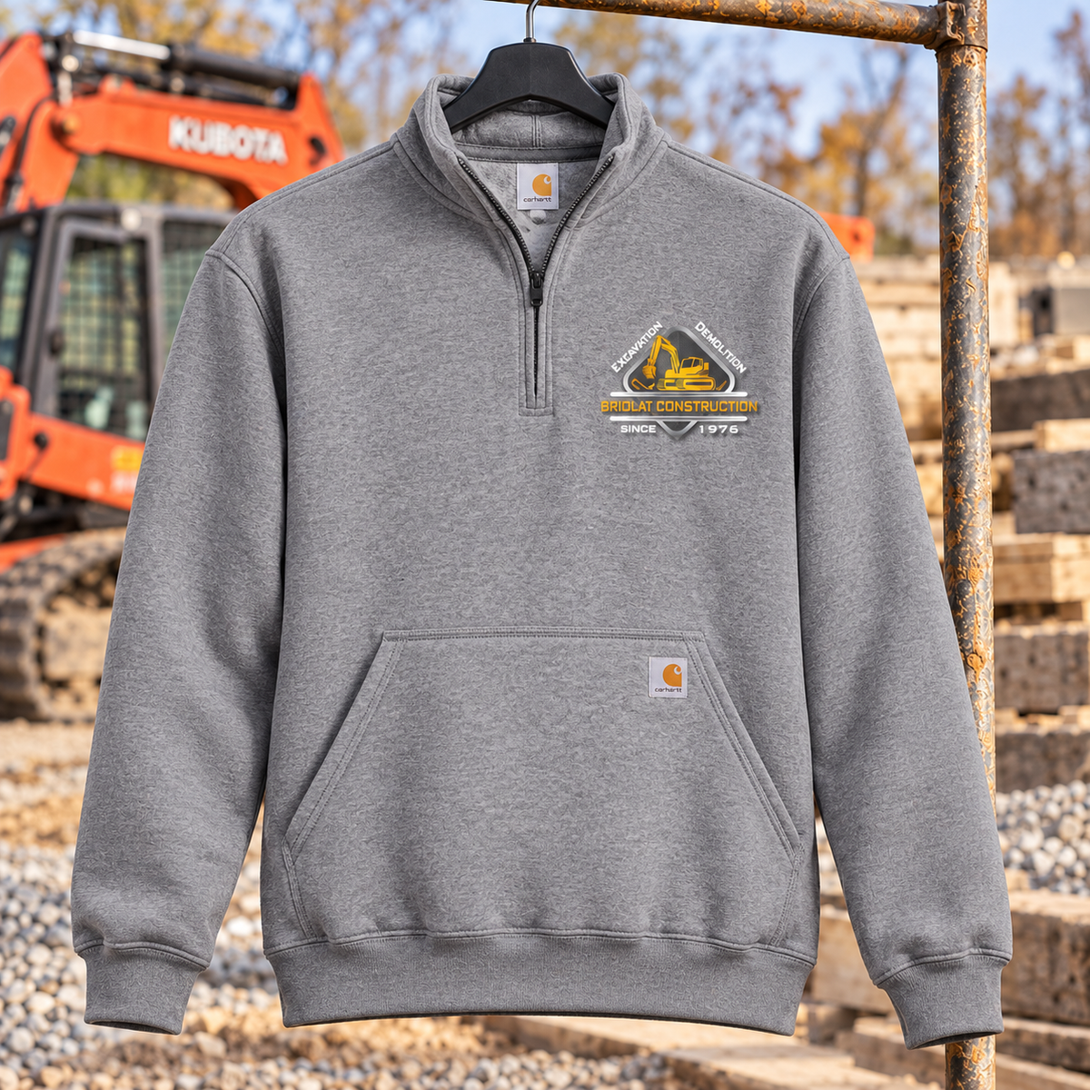 Briolat Construction CT105294 Heather Grey quarter-zip, classic truck logo printed on left chest only — jobsite mockup