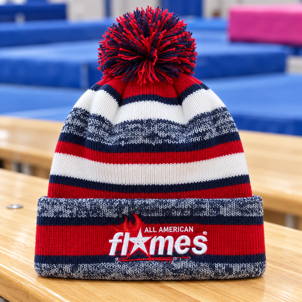 All American Flames embroidered red navy and white striped pom beanie