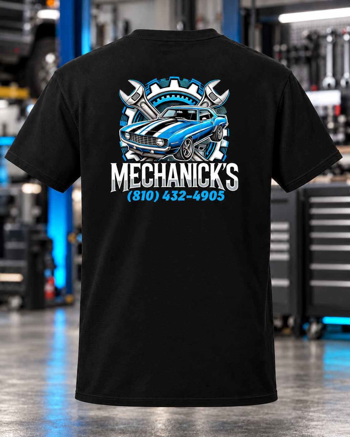 MechaNick’s tee black back v2 with updated artwork in automotive workshop