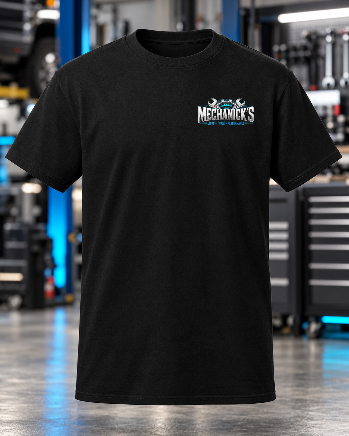 MechaNick’s tee black front with updated artwork in automotive workshop