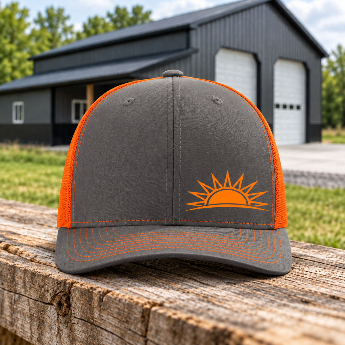Sunrise Creek — 112-EMB — Charcoal / Orange — Front — barn and timber mockup