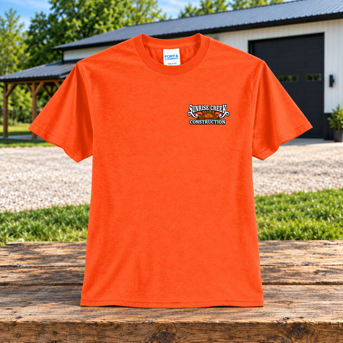 Sunrise Creek — PC55 — Safety Orange — Front — barn and timber mockup
