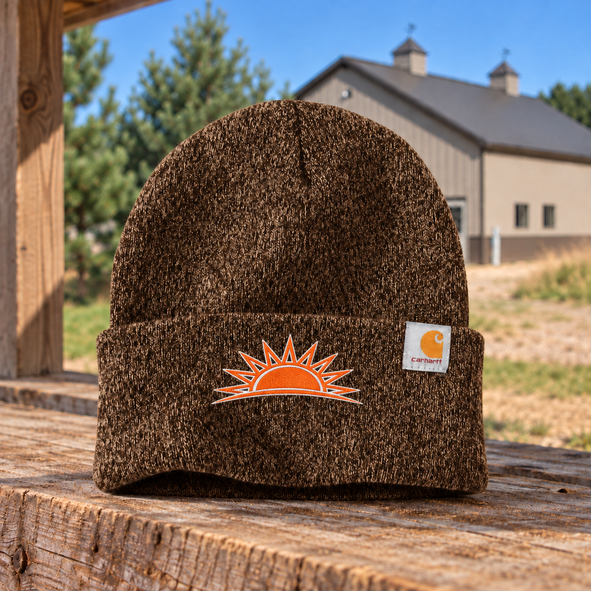 Sunrise Creek CT104597 in Dark/Brown/Sandstone — front view against a pole barn and weathered timber