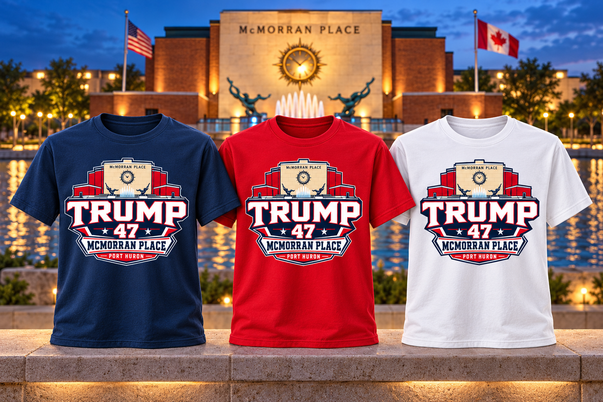 McMorran Arena Badge shirts against McMorran Place at blue hour
