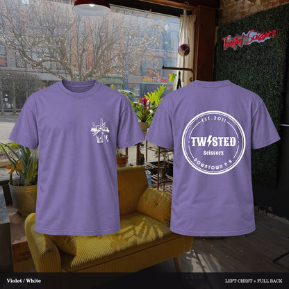 Twisted Scissorz Comfort Colors 1717 — Violet, White artwork; left-chest crest and full back in the salon